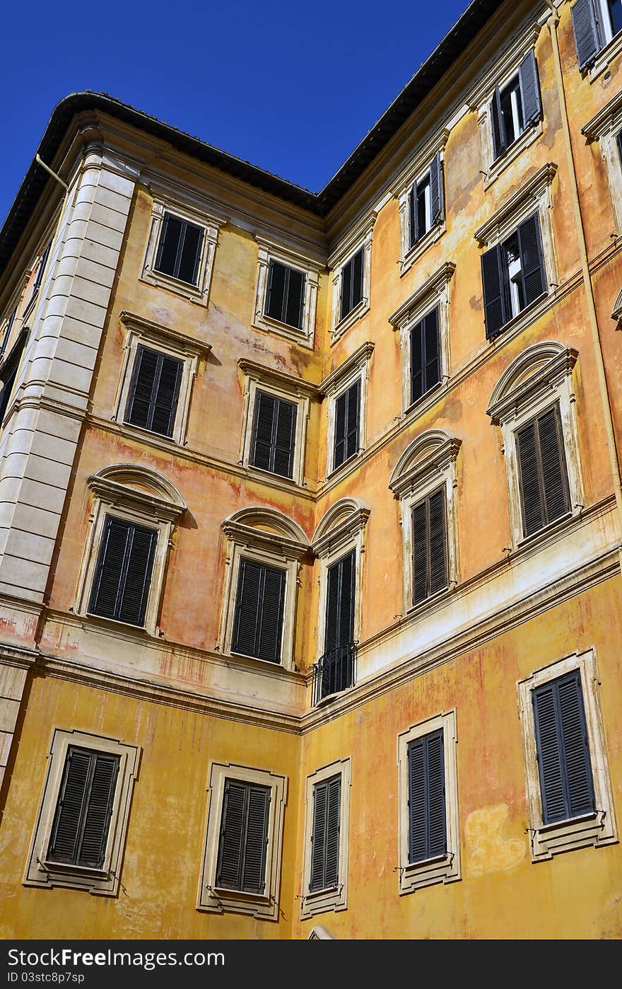 Yellow building corner in center of Rome