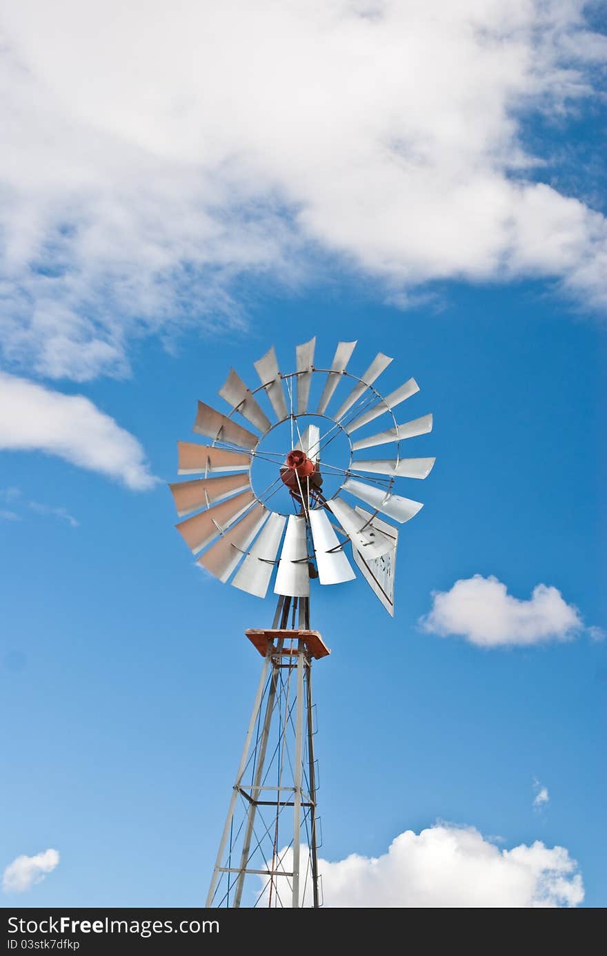 Silver water wheel in Arizona desert