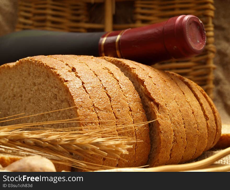 Assortment of baked bread on wood table. Assortment of baked bread on wood table