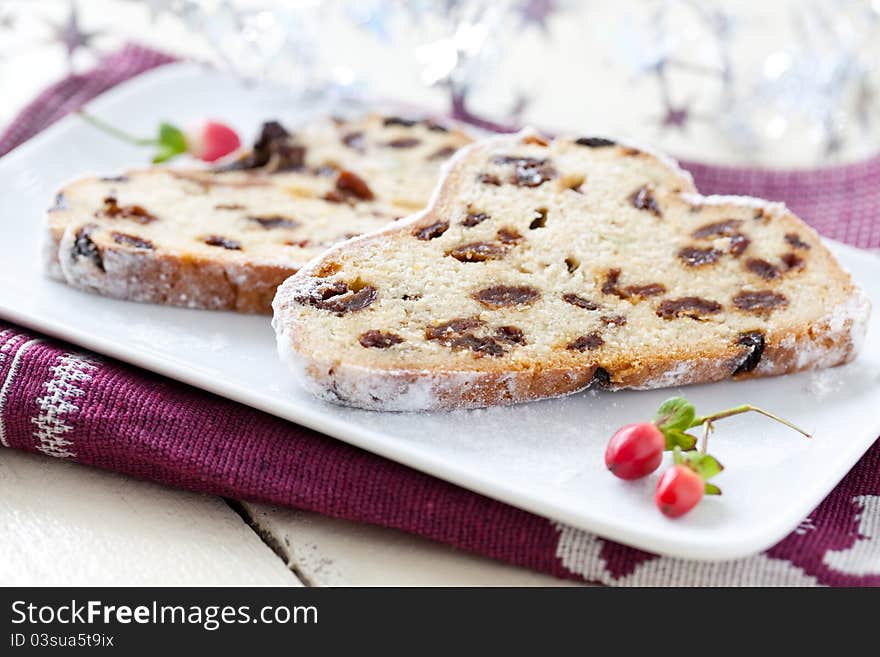 Fresh sliced stollen on a plate. Fresh sliced stollen on a plate