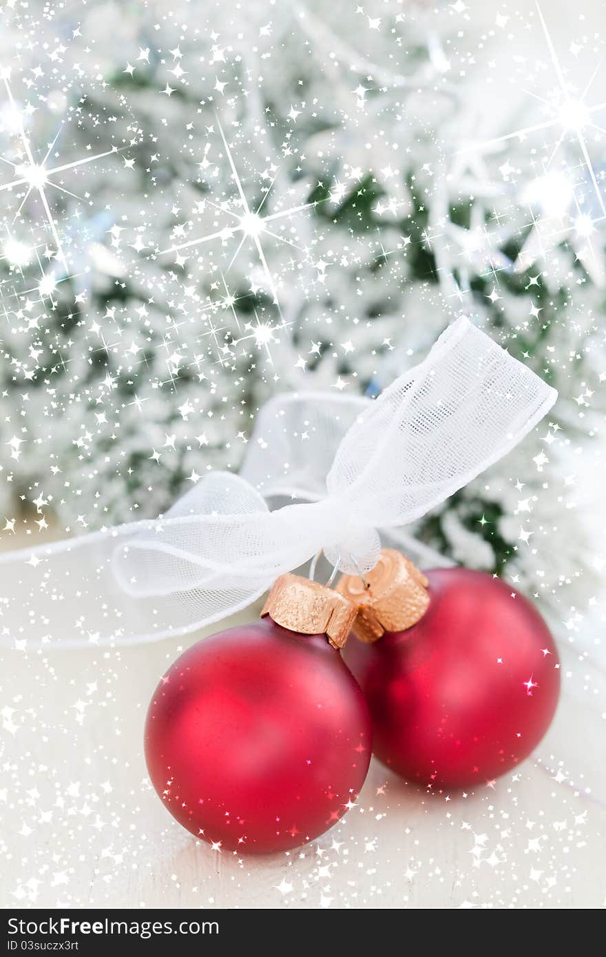 Two decorative christmas balls with ribbon