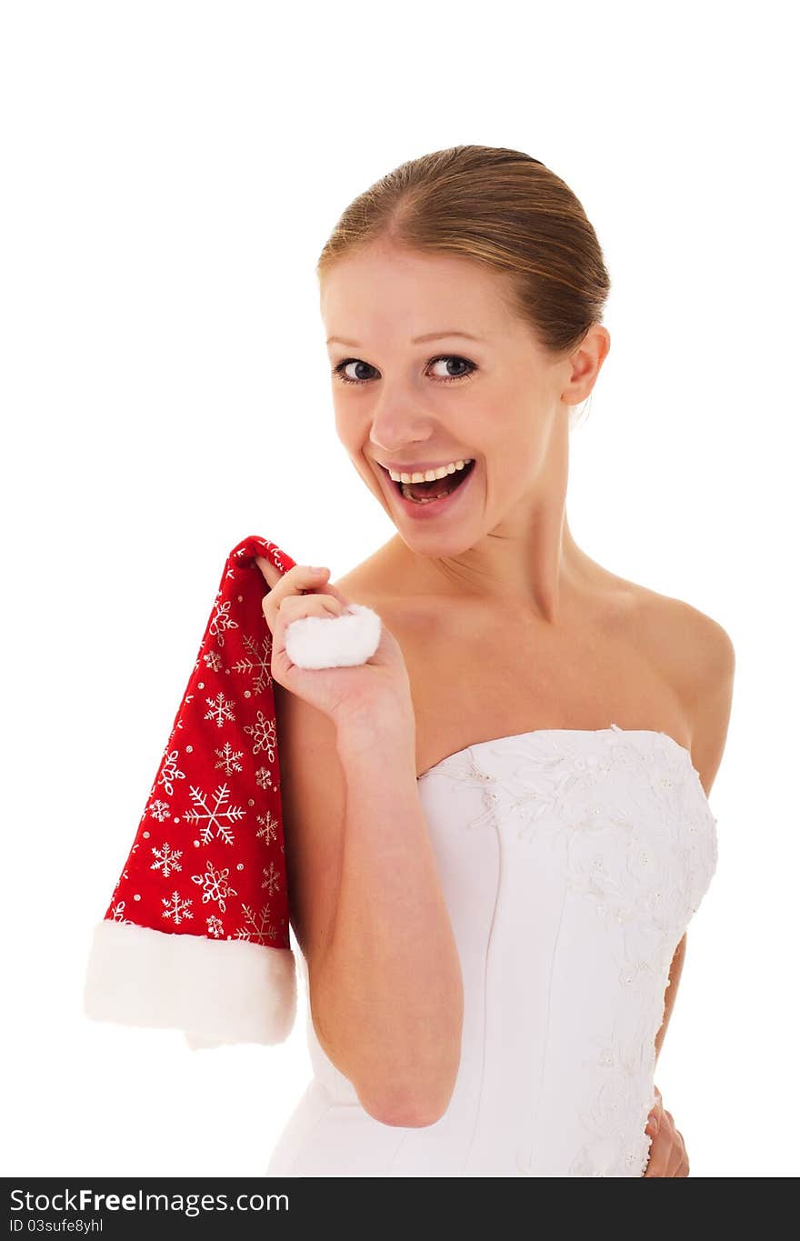 Joyful girl holding a Christmas hat