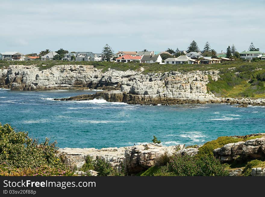 Seaside town with cliffs and ocean in the foreground Hermanus South Africa