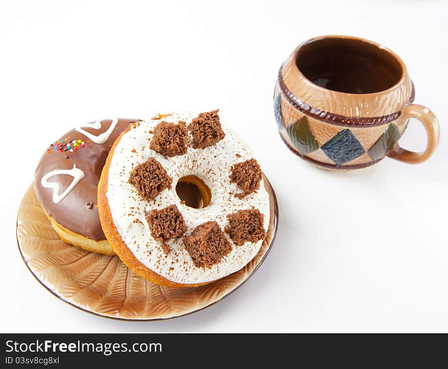 Donuts and coffee on white background