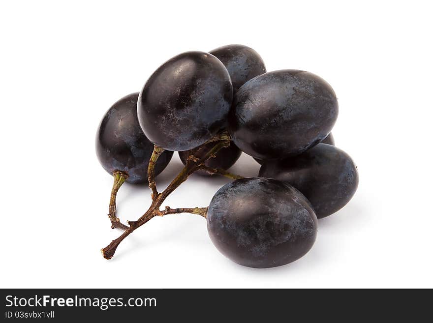 Red grape against white background