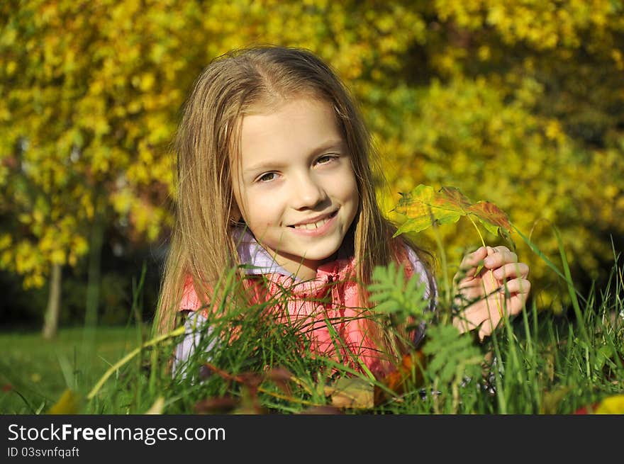 Girl in the autumn park