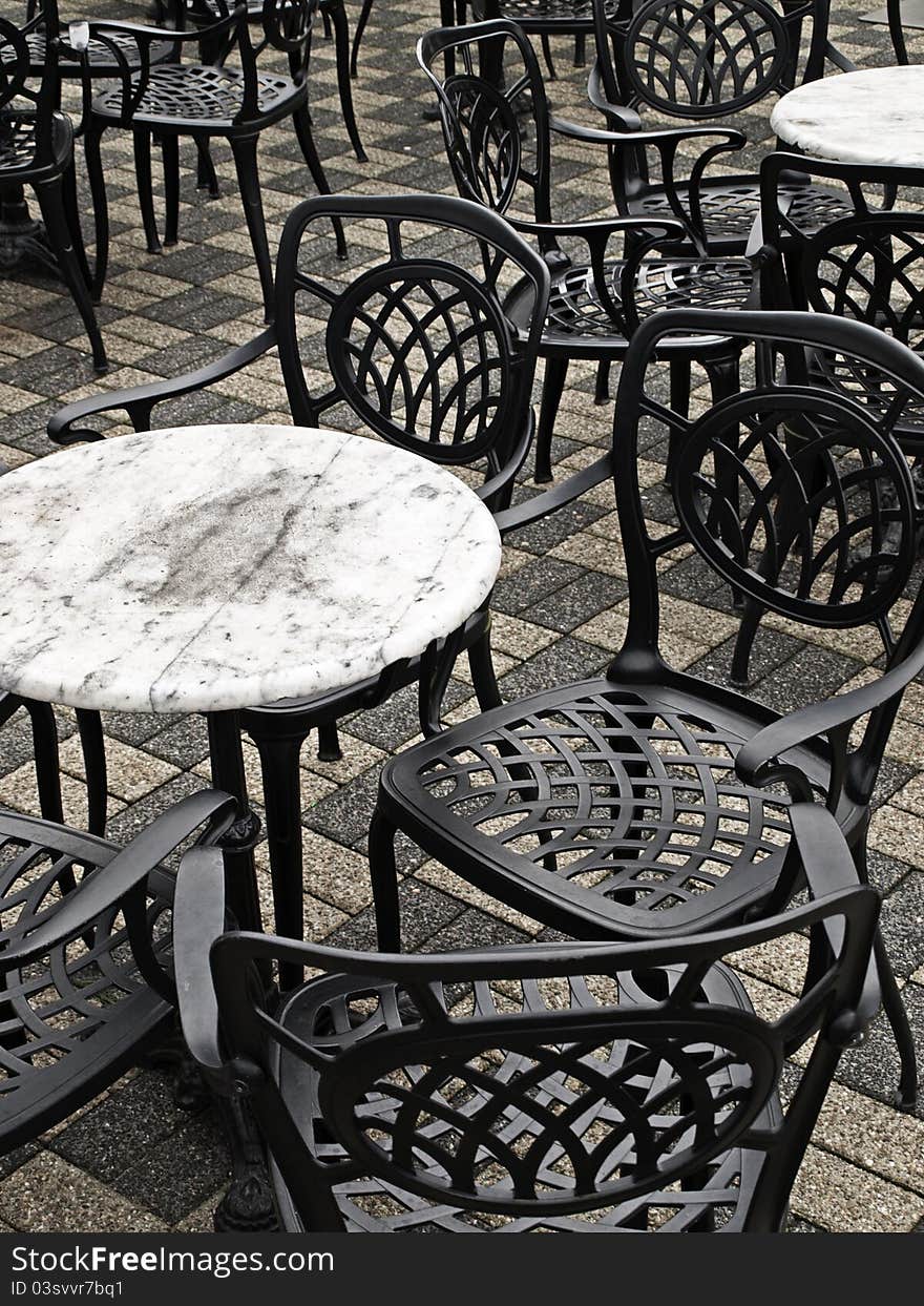 Empty classic looking pavement chairs on french terrace. Empty classic looking pavement chairs on french terrace