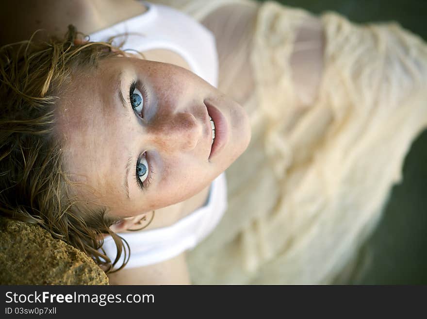 Portrait of a girl with red hair and freckles