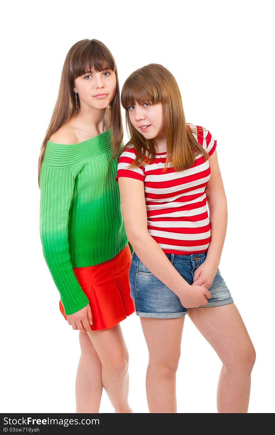 Portrait of two lovely sisters isolated on white background. Portrait of two lovely sisters isolated on white background