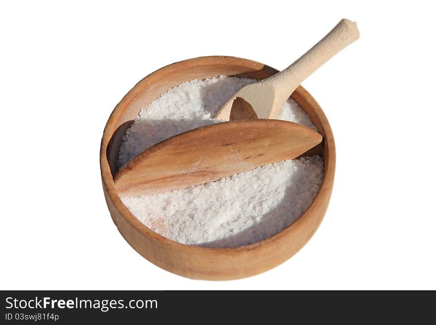 Salt-holder with wooden salt spoon white background