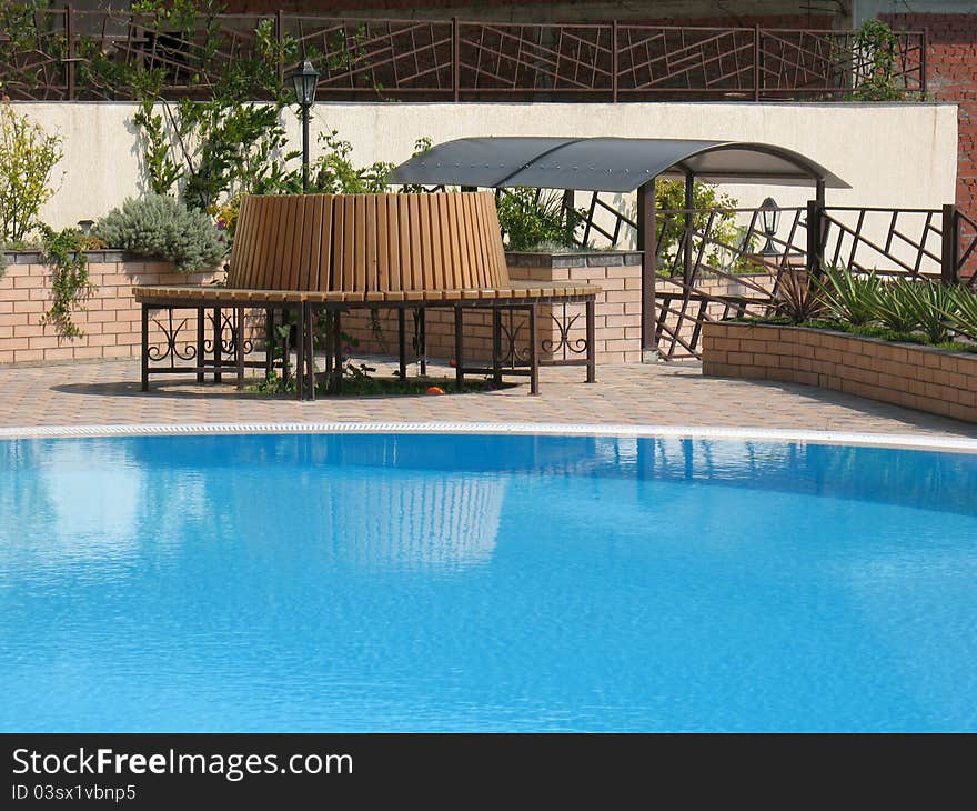 Courtyard Of A Resort Hotel With Swimming Pool