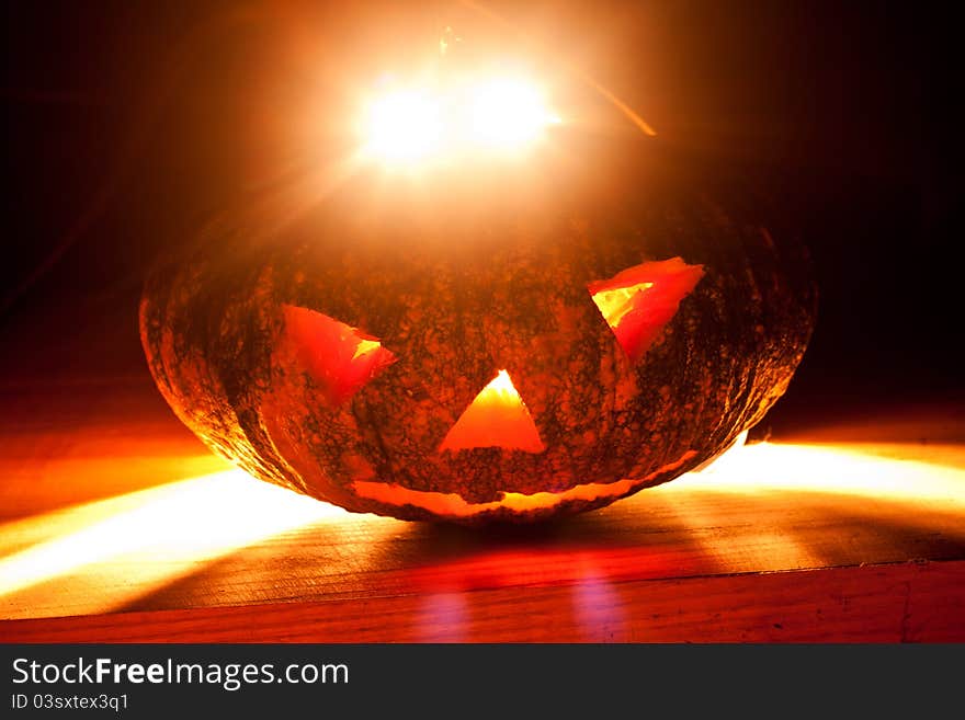 Halloween pumpkin on black background.