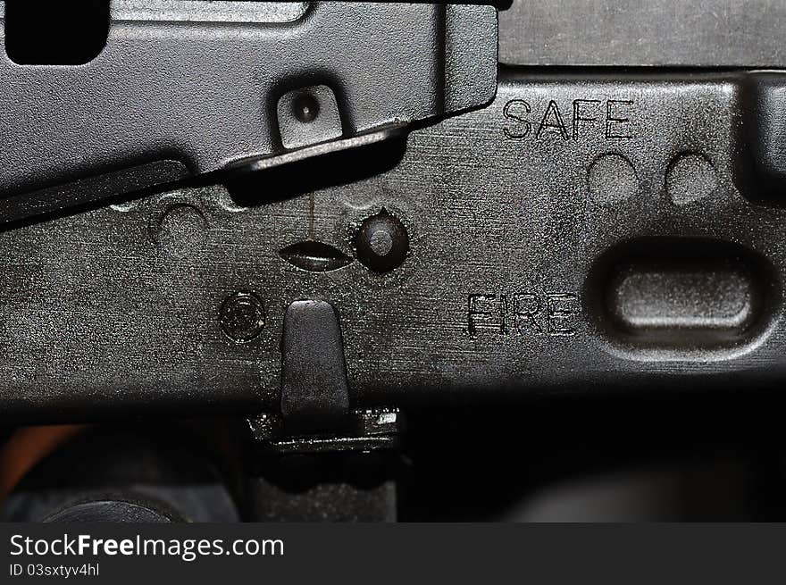 Closeup image of AK 47 shutter with safe and fire mode. Closeup image of AK 47 shutter with safe and fire mode