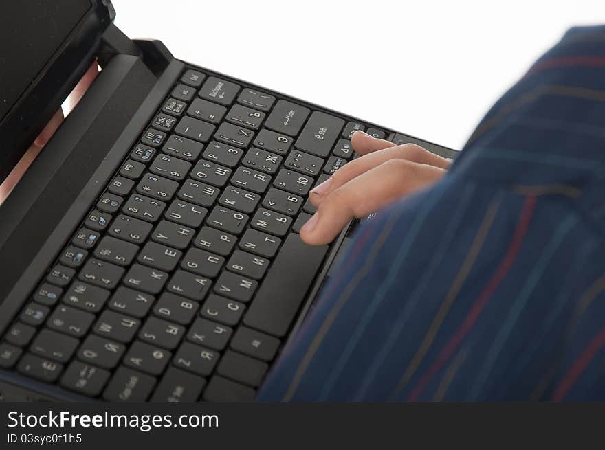 Children s hand on the keyboard