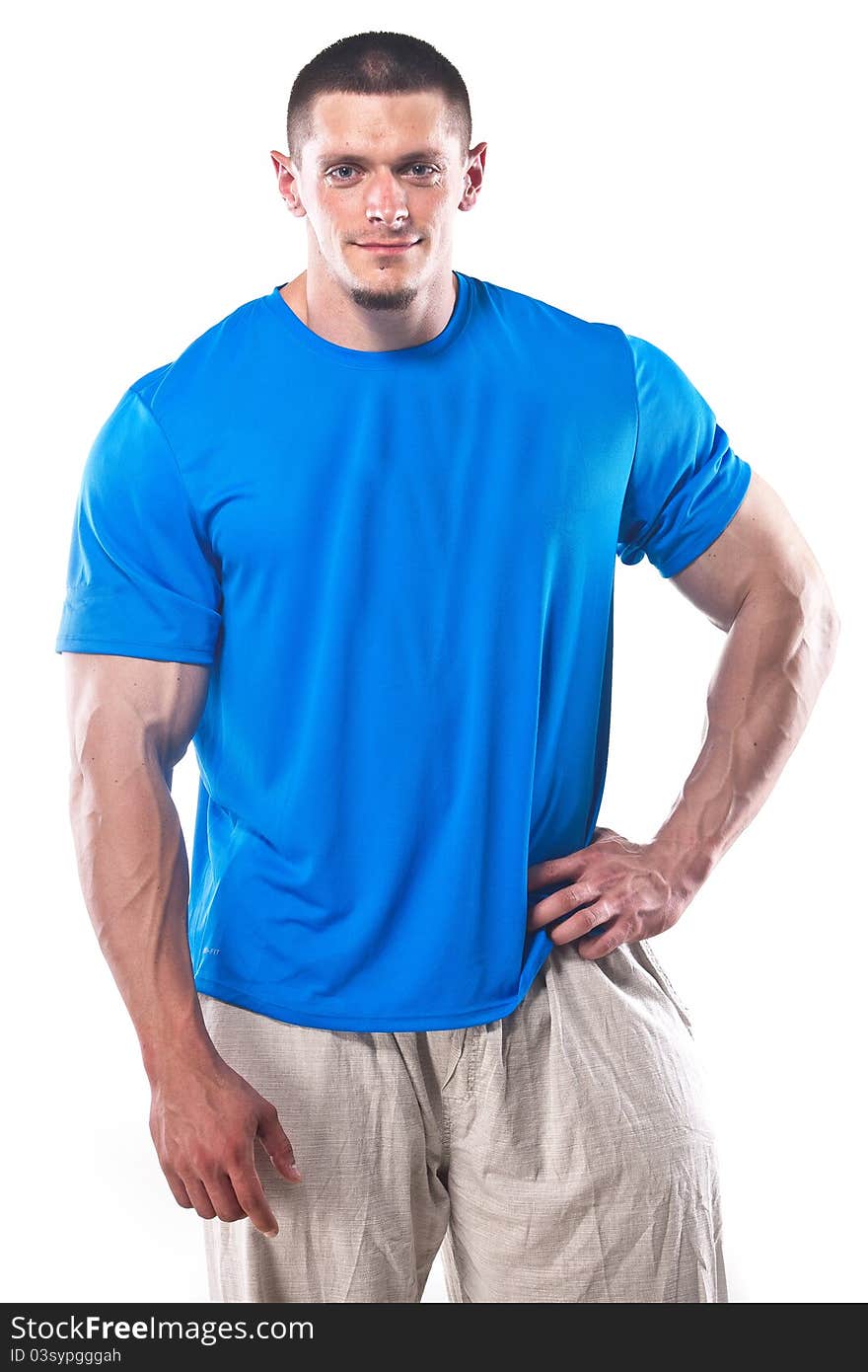 Strong athletic man isolated over white background