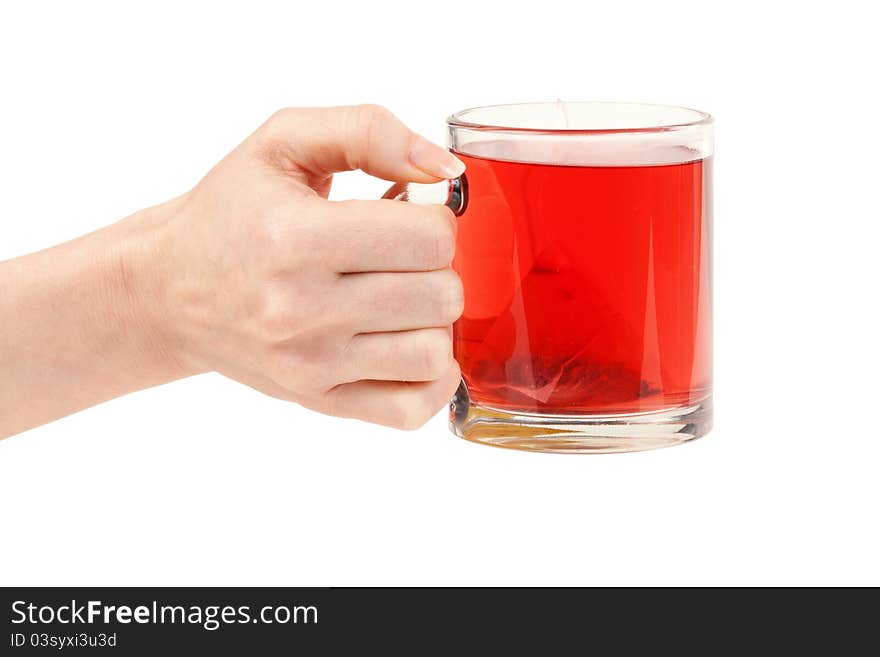 Female hand with a cup of red tea