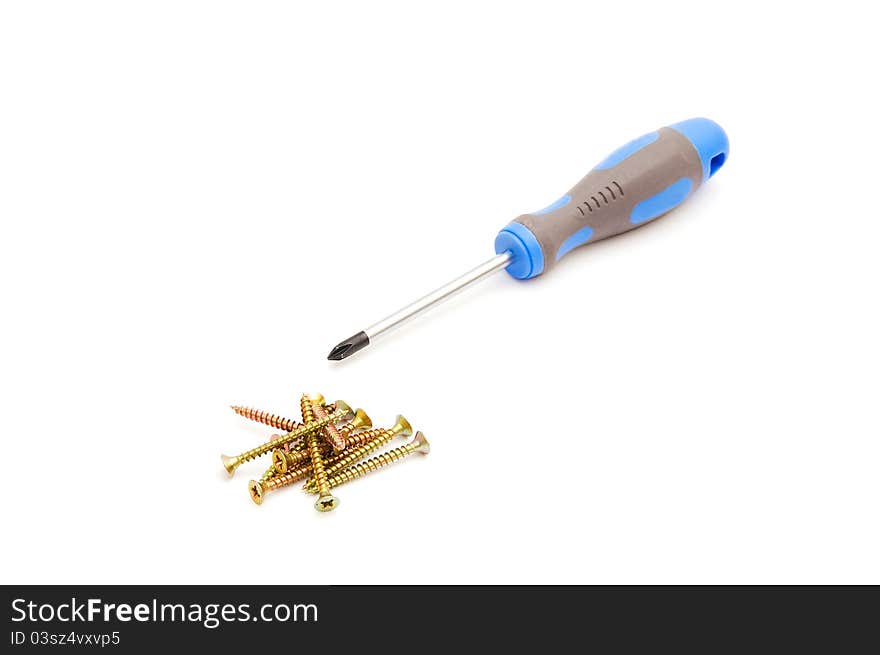 Screwdriver and yellow screws