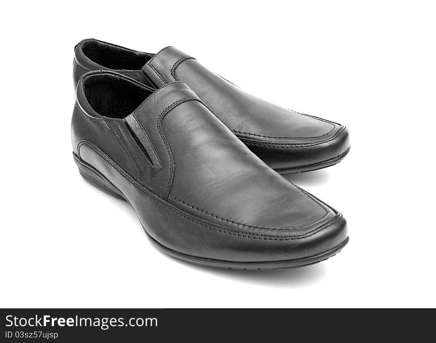 Pair of black man's shoes on white background. Pair of black man's shoes on white background
