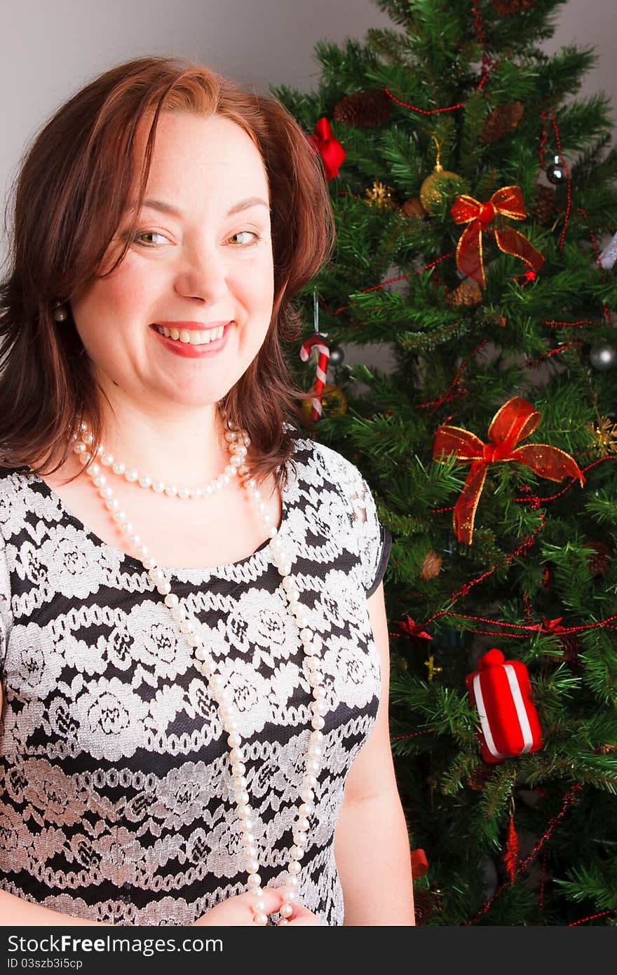 Beutiful Woman Near A Fir-tree