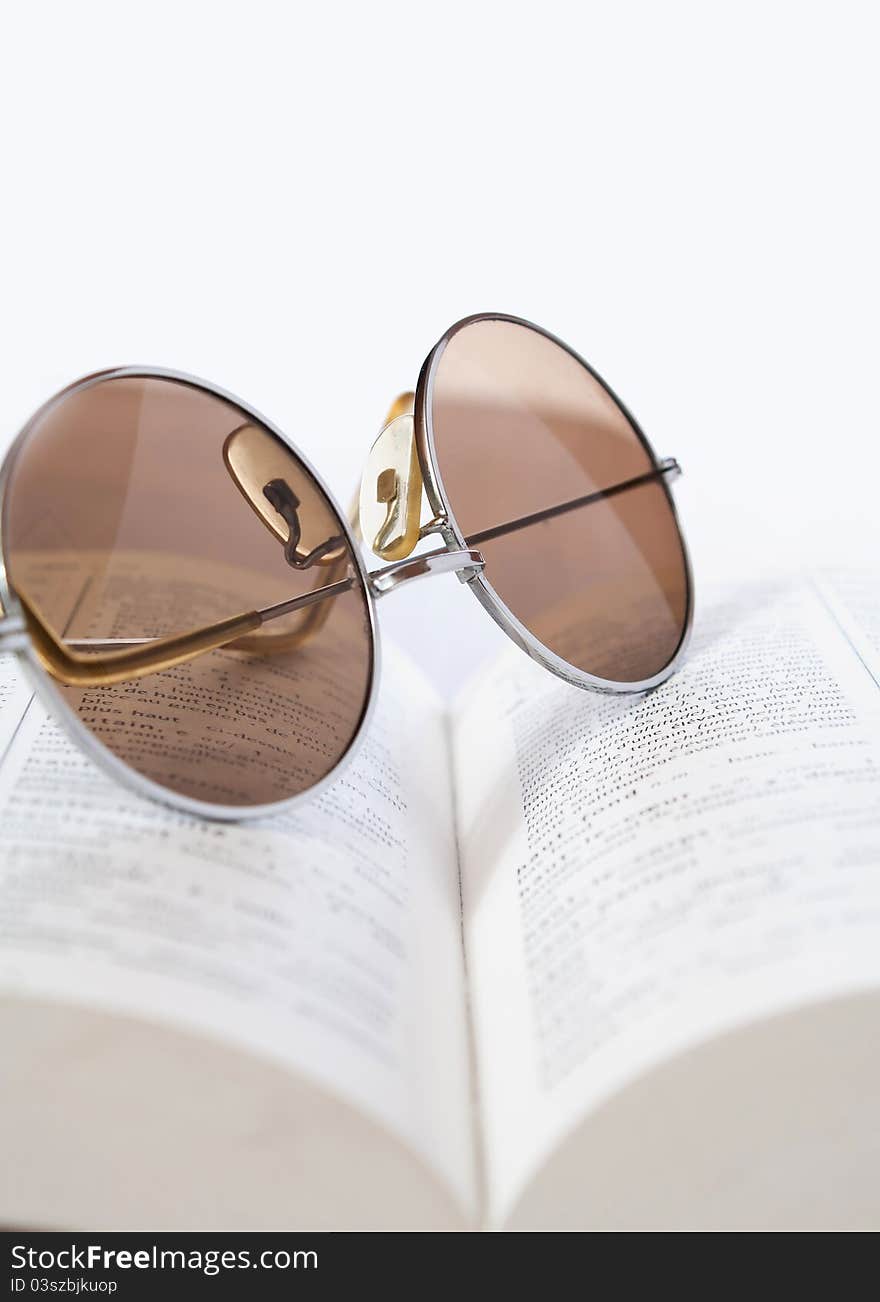 Spectacles On A Book