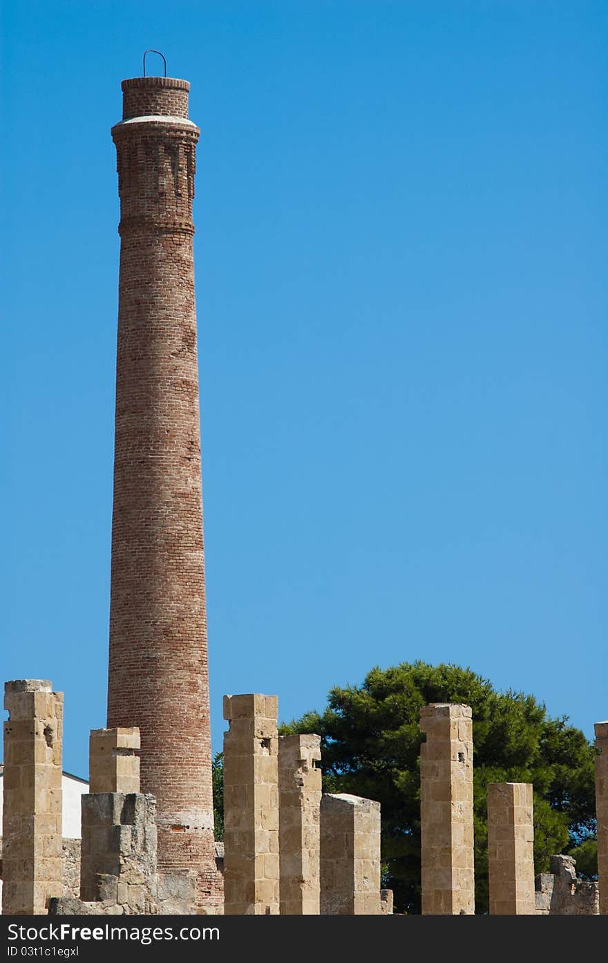 Industrial brick smoke stack in oasis vendicari