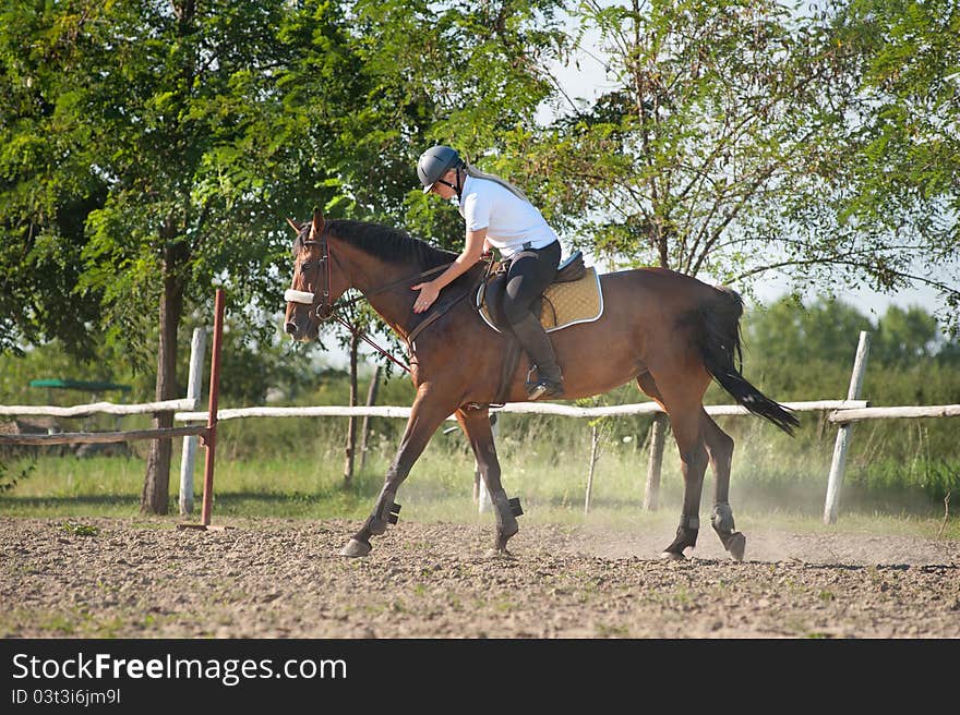 Girl riding a horse