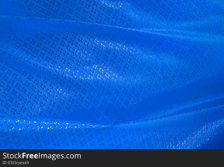 Wave of blue textile for background