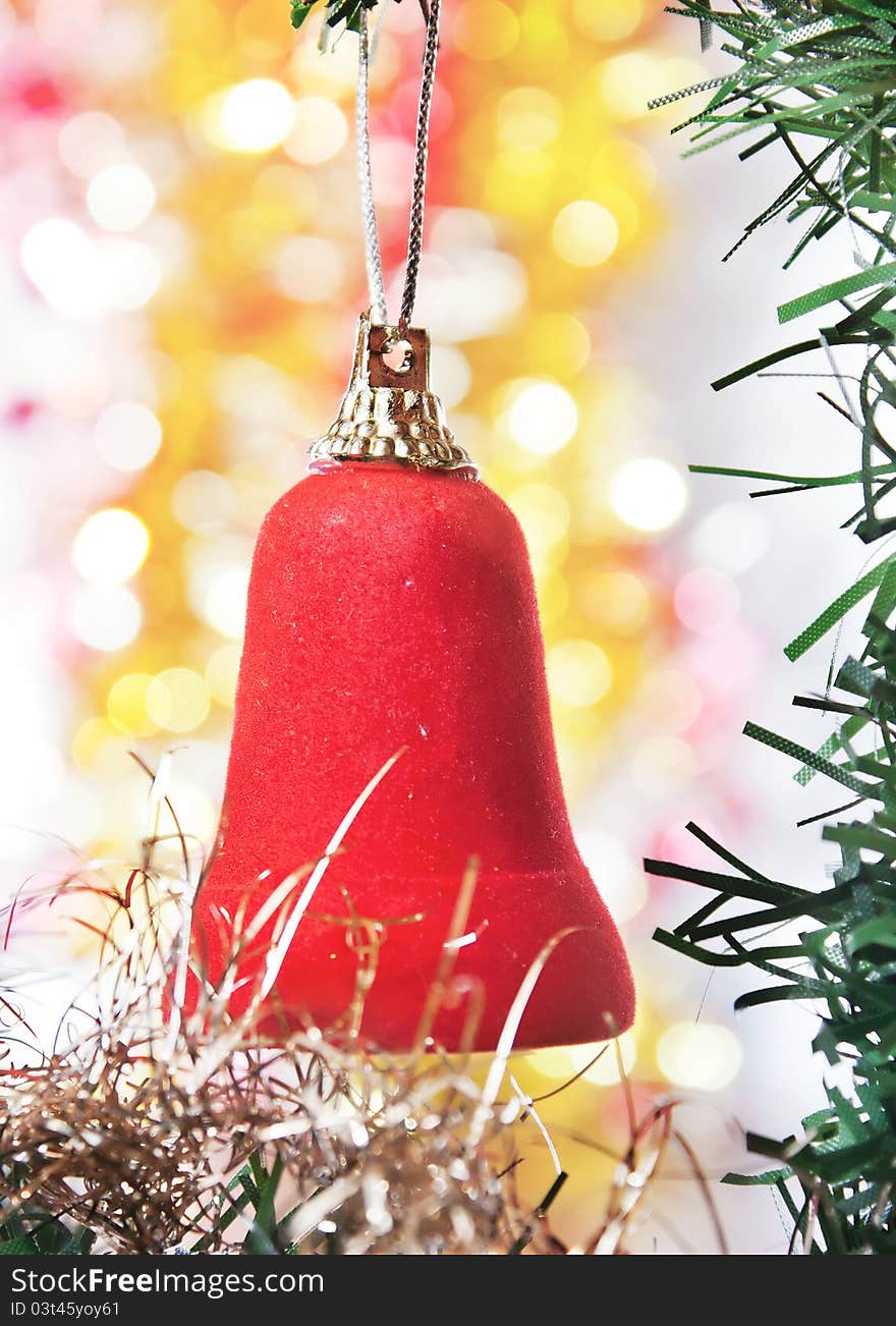 Red bell as a decoration on Christmas tree