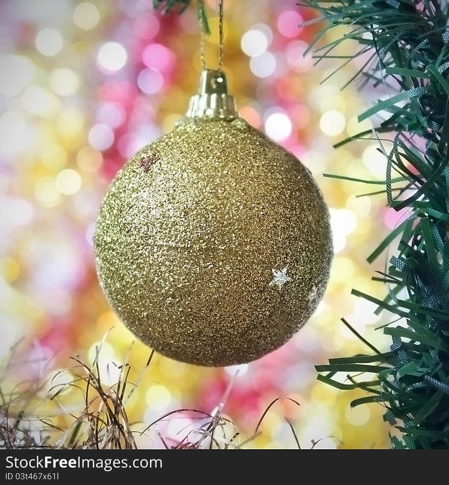 Gold ball as a decoration on Christmas tree