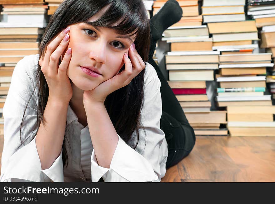 Young student girl on the floor