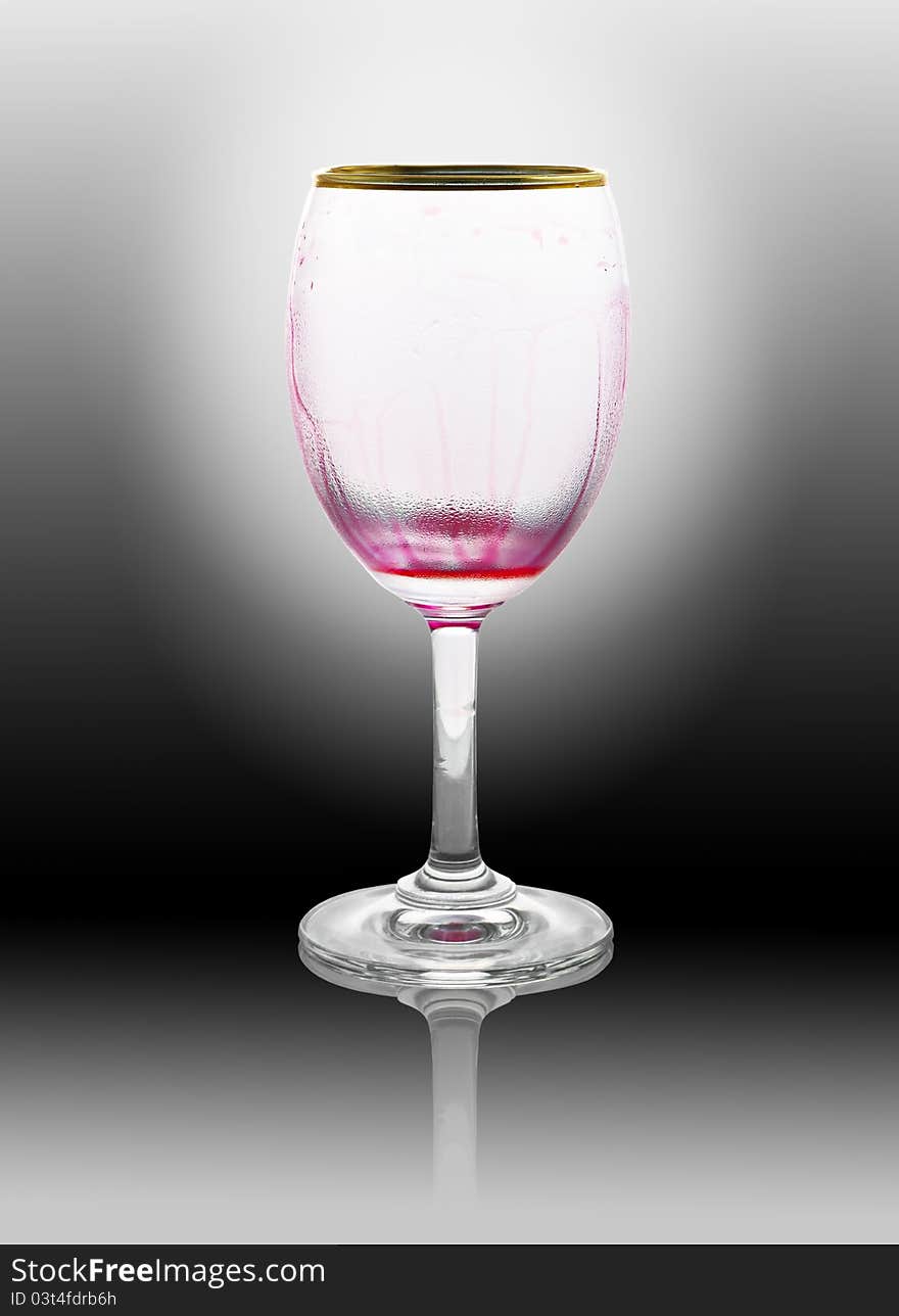 Red wine glass is empty on black background. Red wine glass is empty on black background