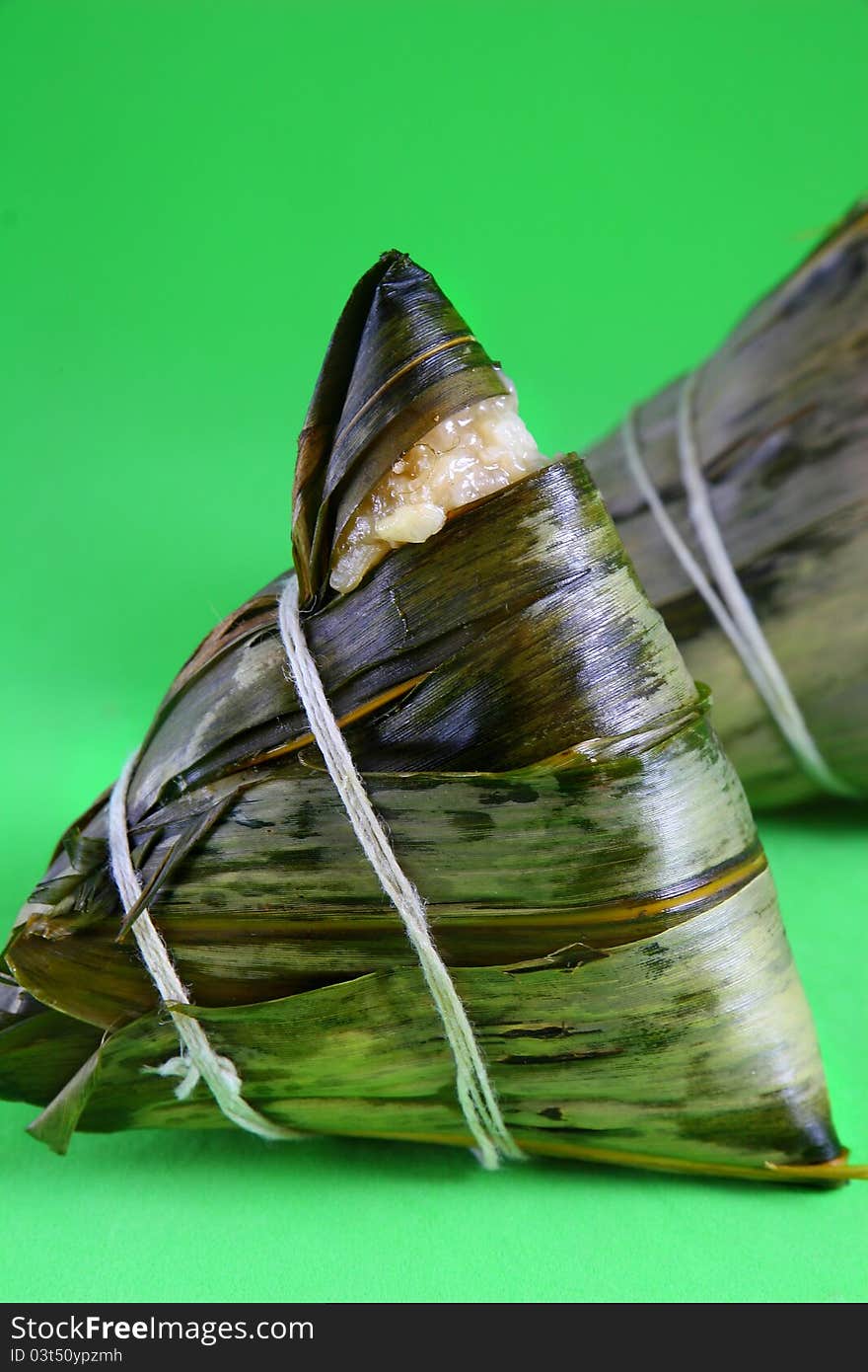 Traditional Chinese rice pudding on green background