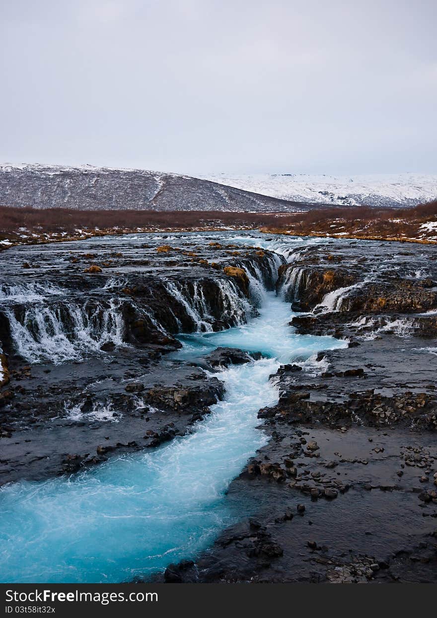 Picture of a beautiful waterfall in Iceland. The name of this waterfall is Bruararfoss. Picture taken in february 2011.