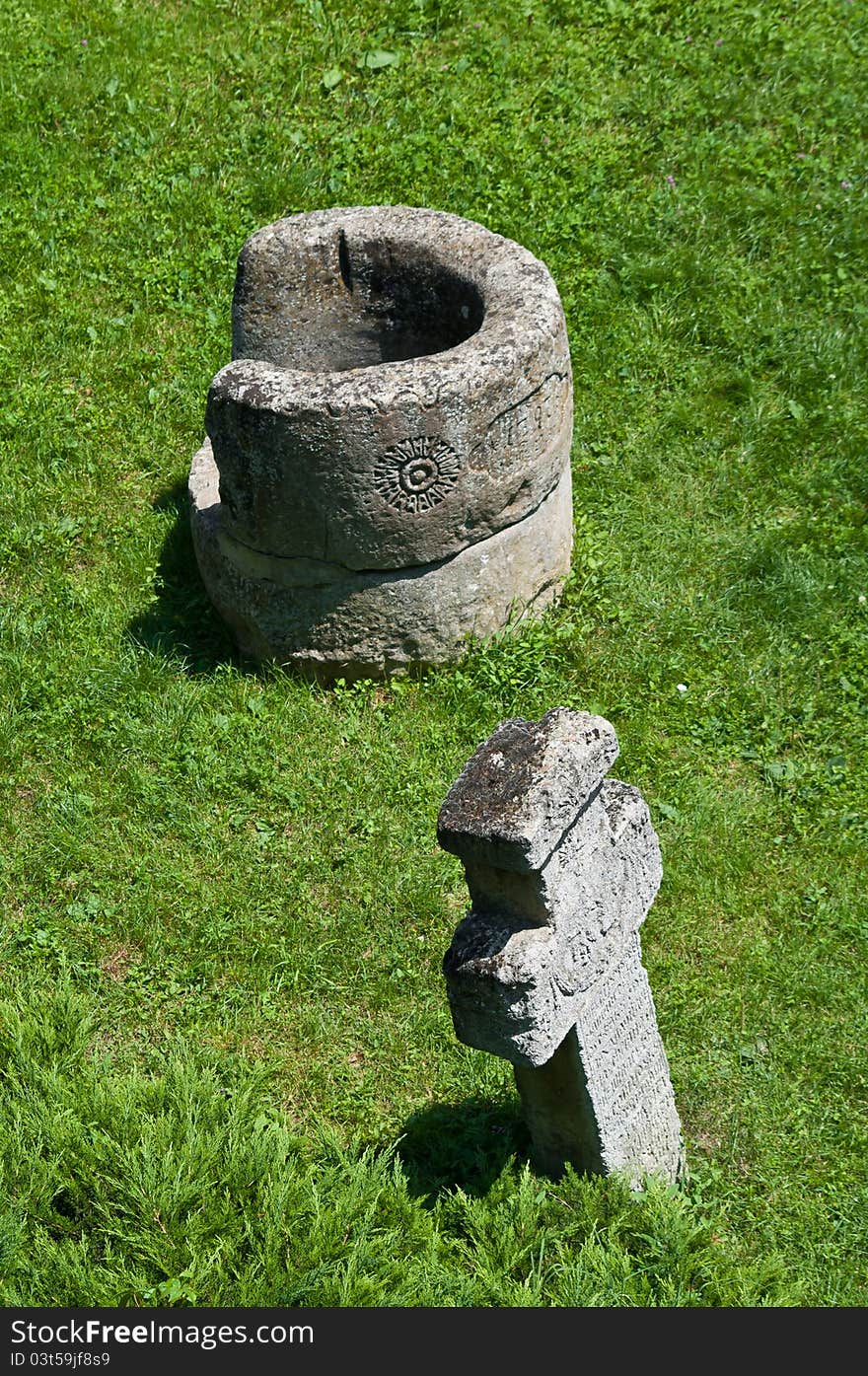 Stone cross and well margins dating back to the Medieval times.