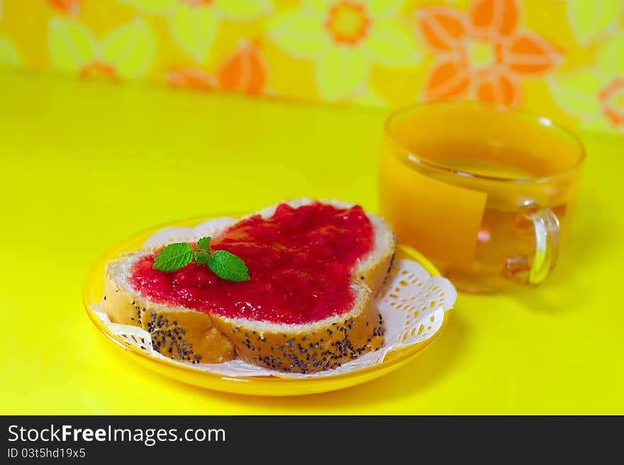 Strawberry jam on a white bread decorated on yellow background. Strawberry jam on a white bread decorated on yellow background