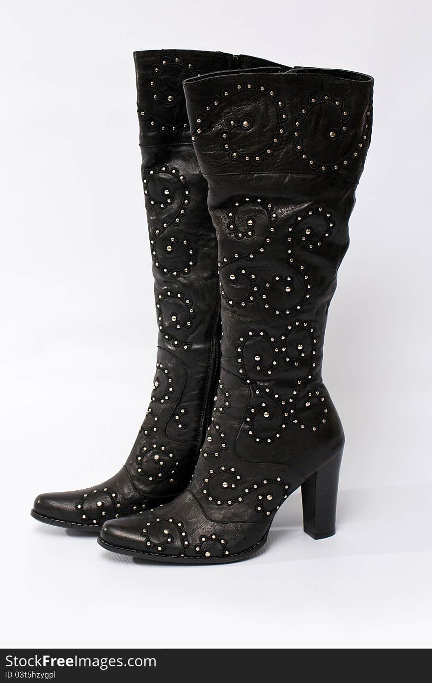 Female leather boot with high heel