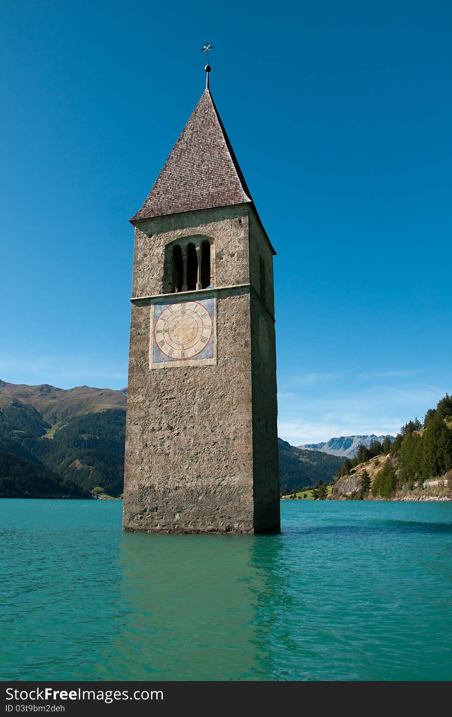 The submerged bell tower - Resia lake (South Tyrol). The submerged bell tower - Resia lake (South Tyrol)