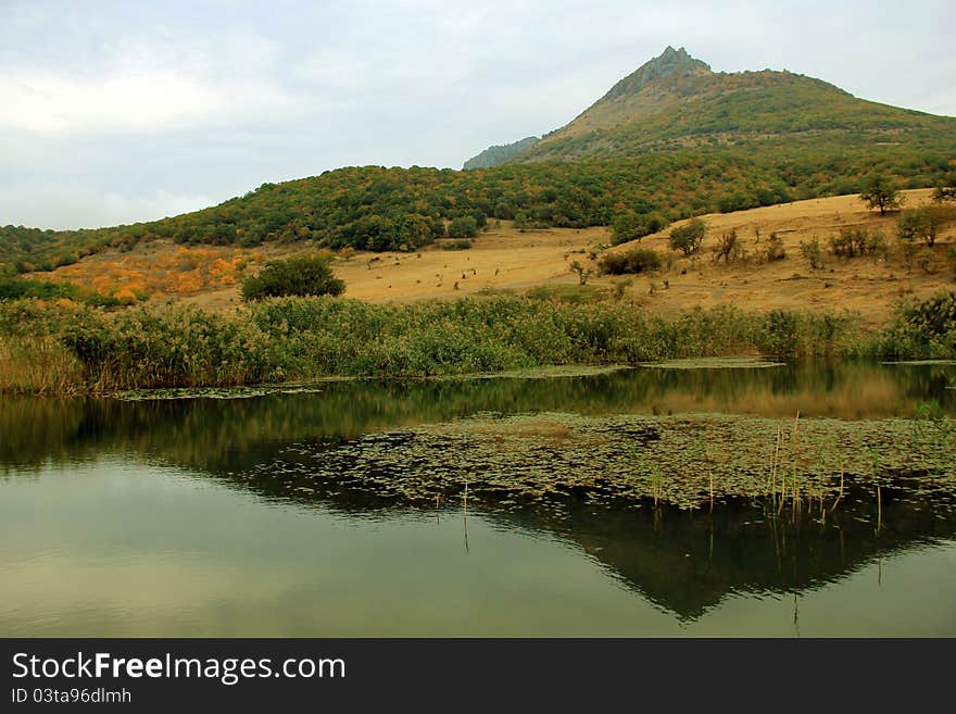 Mountain lake near Demerdj in autumn