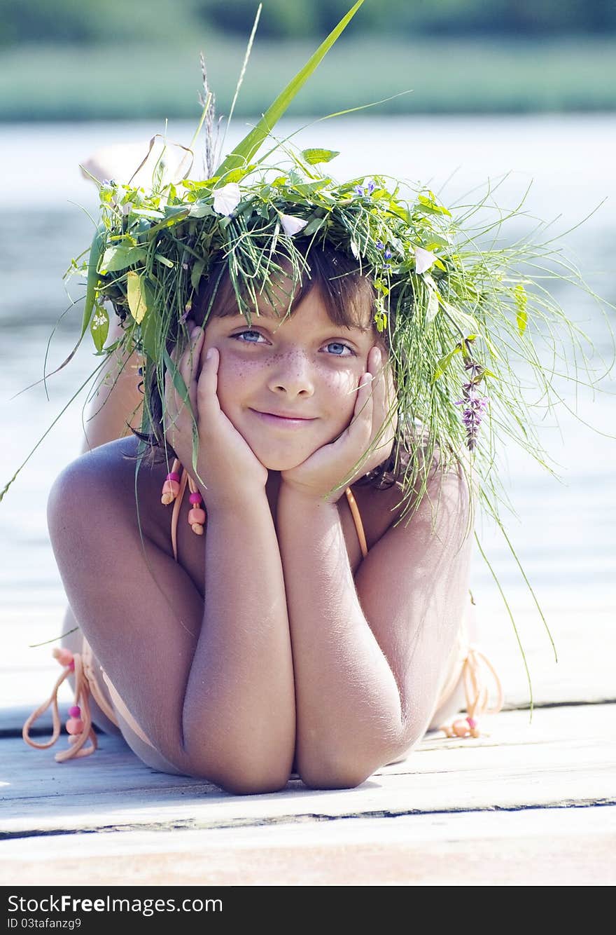 Happy Blue-eyed Girl With Wreath