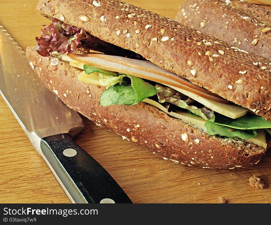 Healthy sandwich with salads, cheese and meat