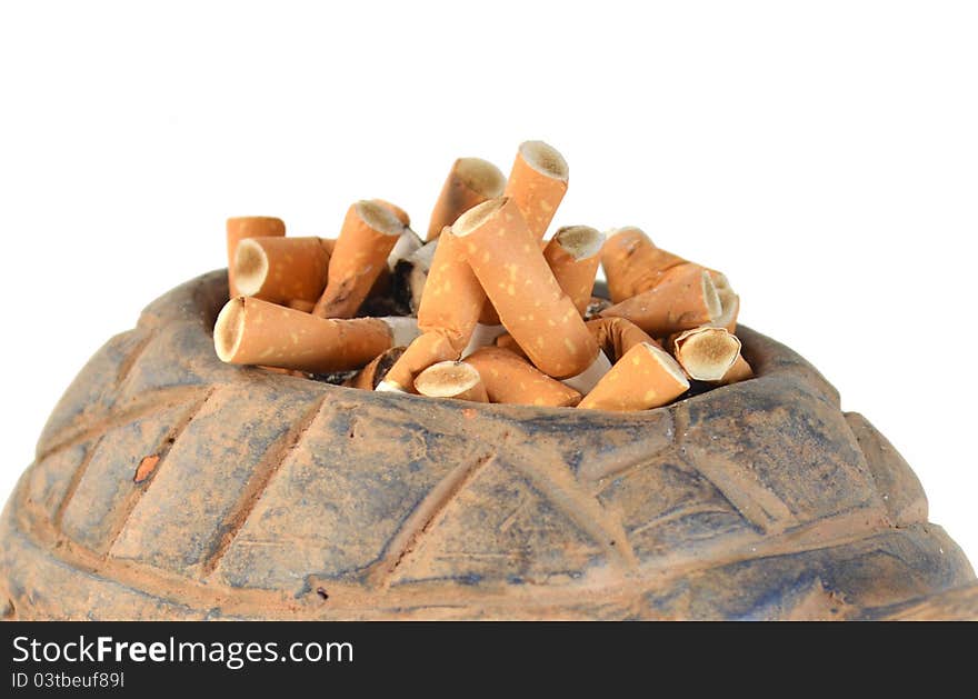 Cigarette butts on white background