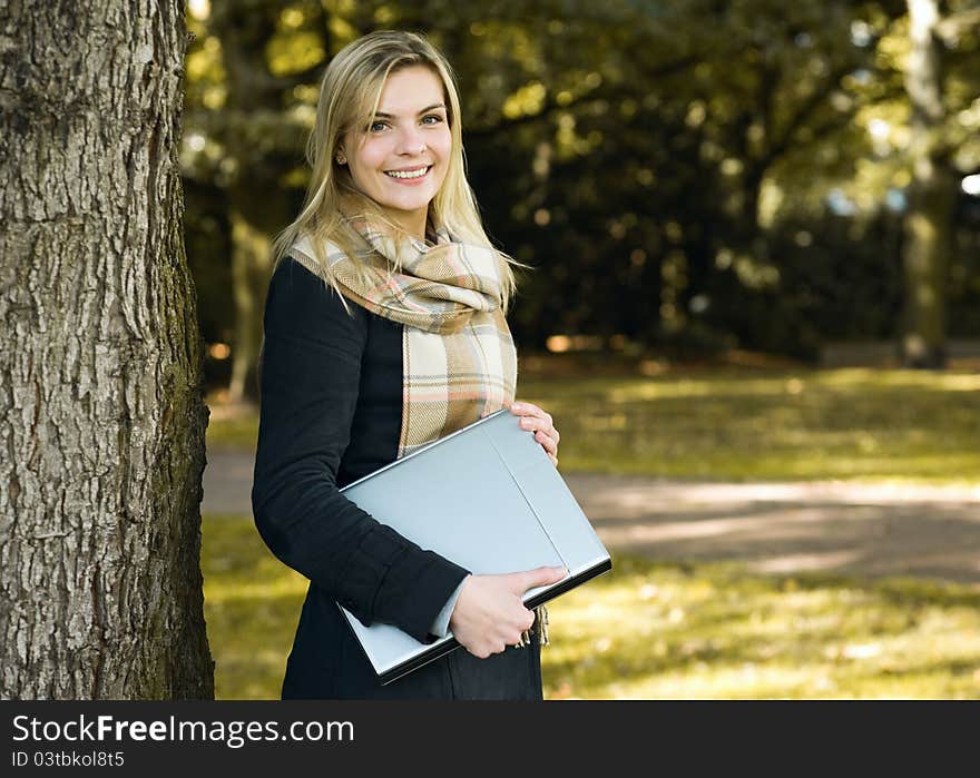 Young woman with notebook