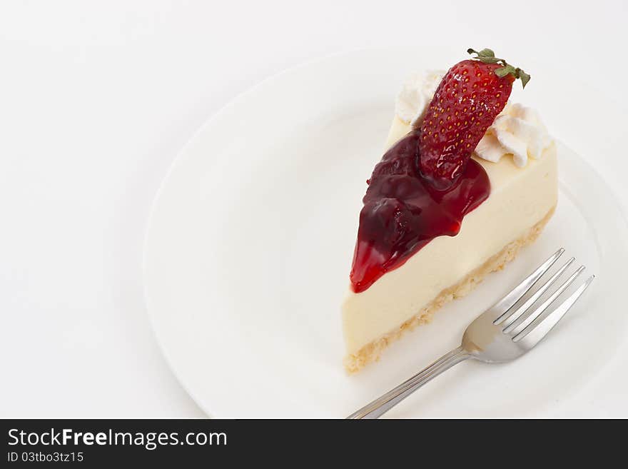 Strawberry Cheesecake on plate and white background