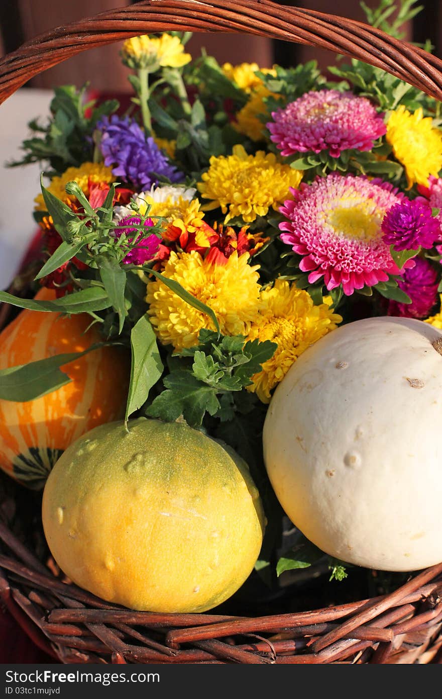 Colorful decorative flower and pumpkin basket. Colorful decorative flower and pumpkin basket.