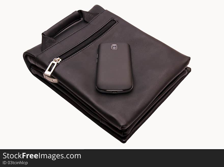 Men s handbag and smartphone