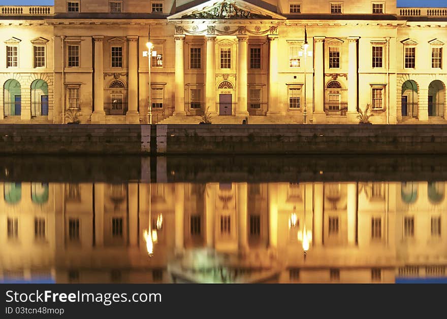 Reflection of the Neoclassical (Custom house) architecture in the water. Reflection of the Neoclassical (Custom house) architecture in the water