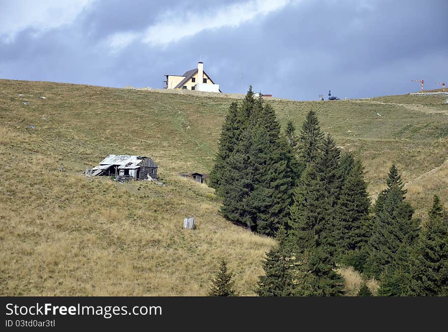 Two cottage near pine forest on mountain top