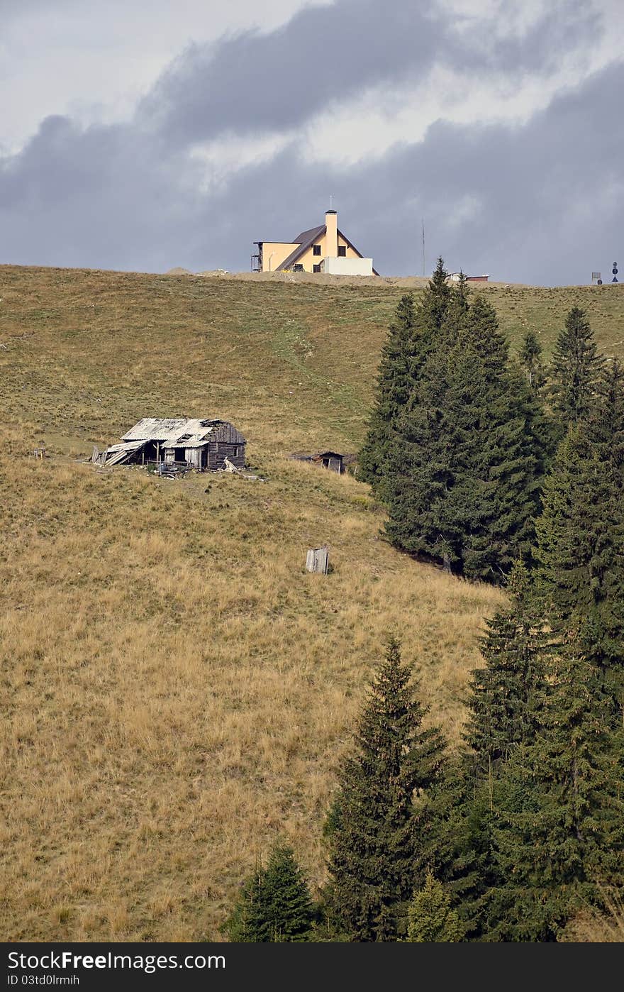 Two cottage near pine forest on mountain top. Two cottage near pine forest on mountain top