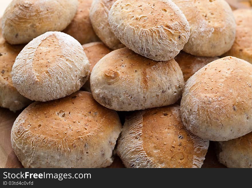 Baked fresh buns in a pile.