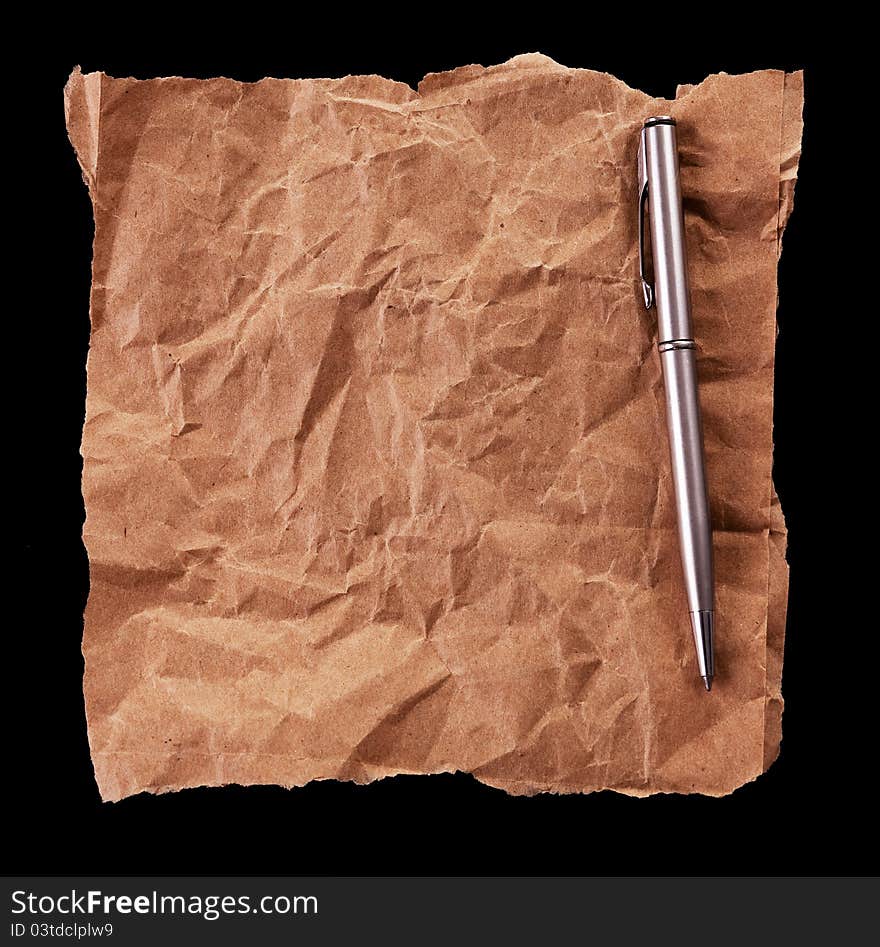 Crumpled sheet of paper on a black background